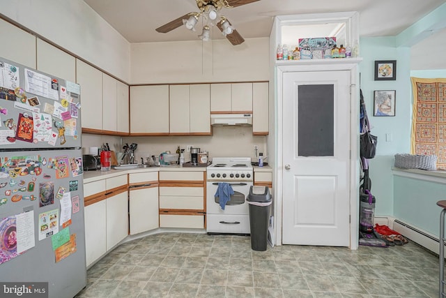 kitchen featuring ceiling fan, high end stove, light tile patterned flooring, and fridge