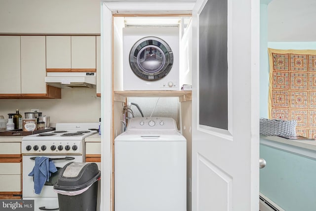 laundry area with stacked washer / dryer and a baseboard heating unit