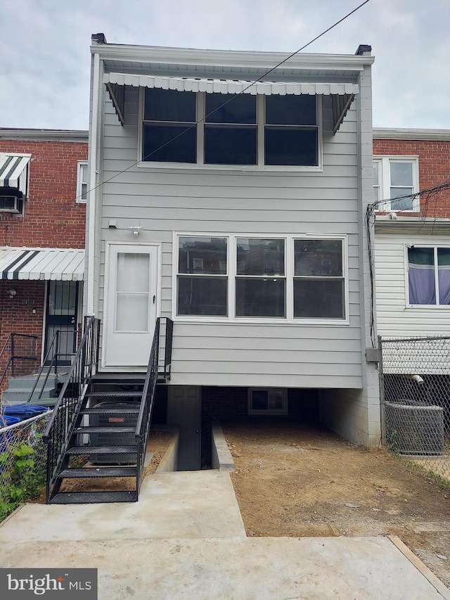 view of property featuring entry steps