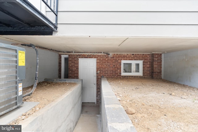 property entrance with central AC unit