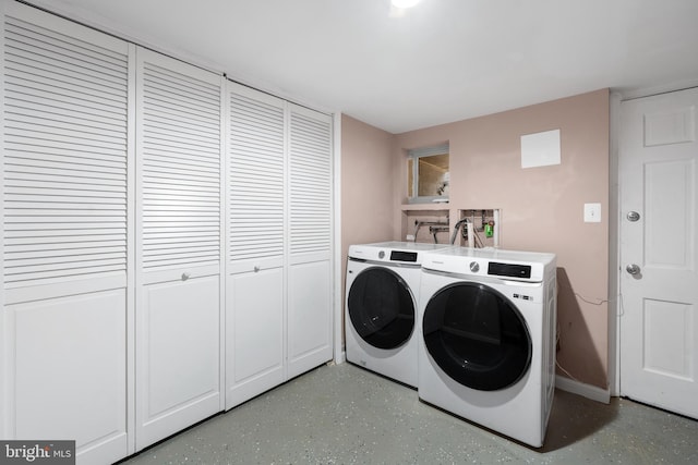 laundry area featuring washing machine and dryer