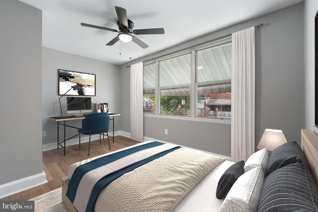 bedroom featuring baseboards, dark wood finished floors, and a ceiling fan