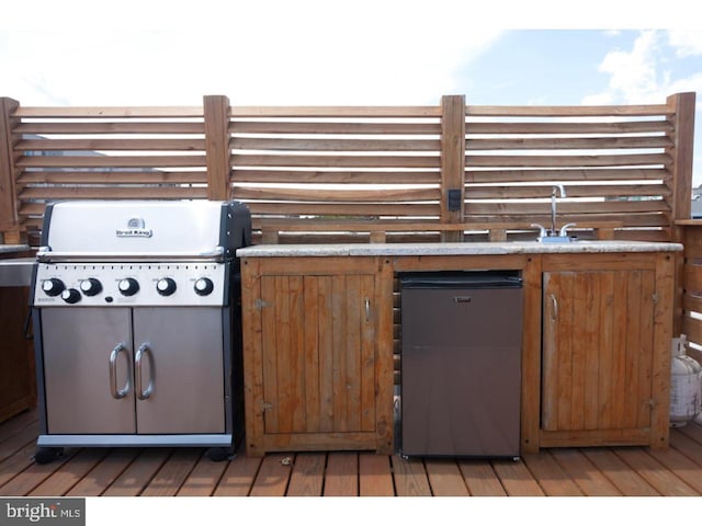 view of patio / terrace featuring sink and grilling area