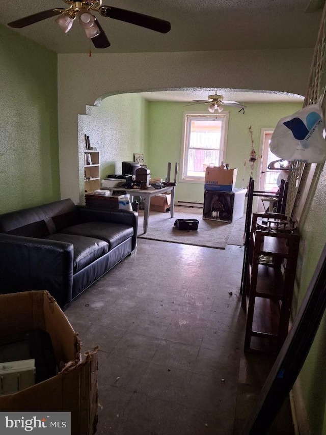 living room featuring ceiling fan