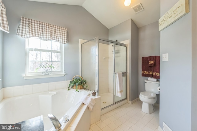 bathroom featuring plus walk in shower, tile patterned floors, toilet, and lofted ceiling