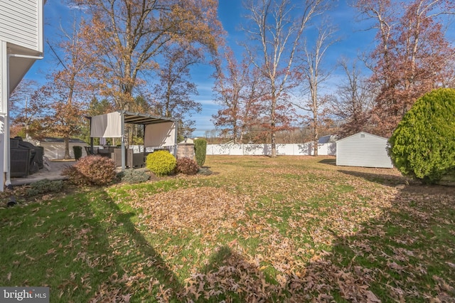 638 Mills Ln, Williamstown, NJ 08094 - view of yard with a storage shed and an outbuilding