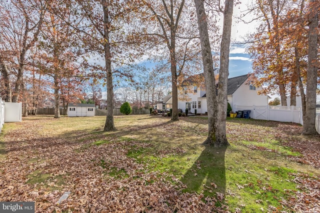 638 Mills Ln, Williamstown, NJ 08094 - fenced backyard featuring an outbuilding and a shed