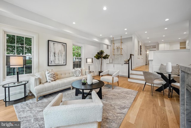 living room with light hardwood / wood-style floors