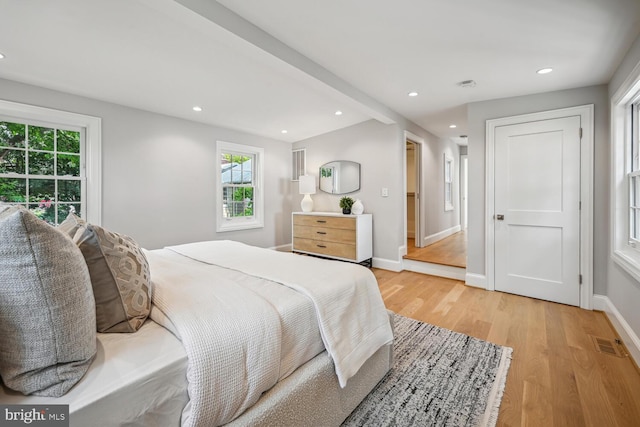 bedroom with light hardwood / wood-style flooring