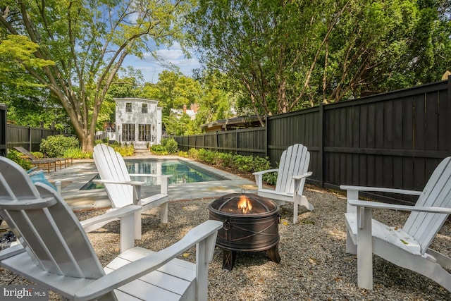 exterior space featuring a fire pit