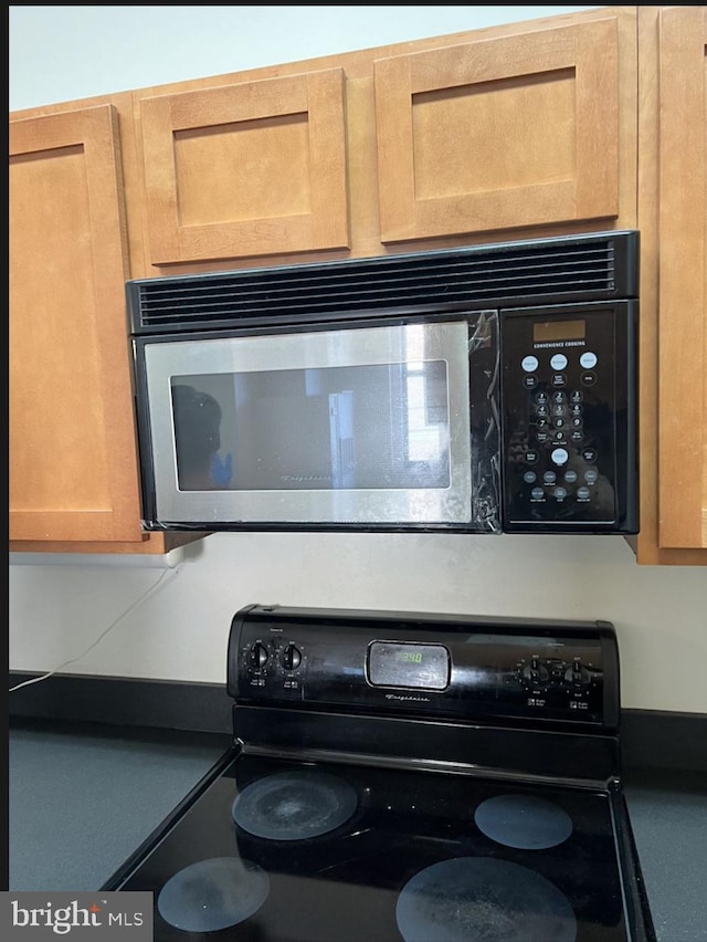 room details featuring black appliances