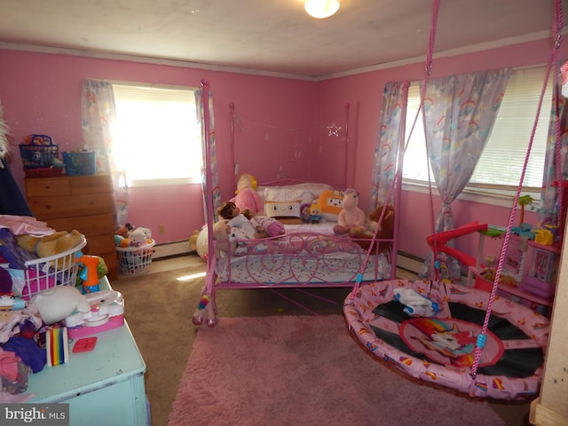 carpeted bedroom with a baseboard heating unit and crown molding