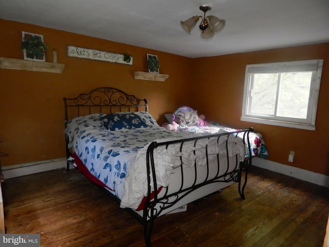 bedroom featuring dark hardwood / wood-style floors