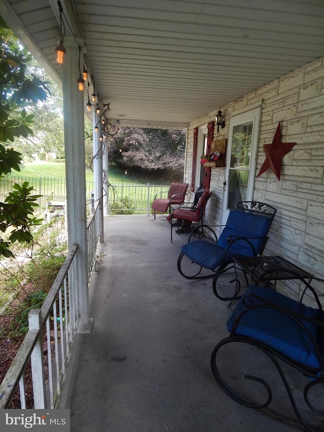 view of patio / terrace with a water view