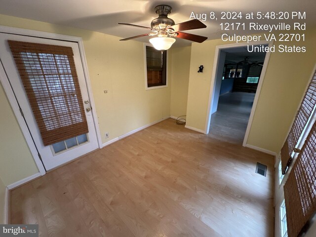 empty room featuring light hardwood / wood-style flooring and ceiling fan