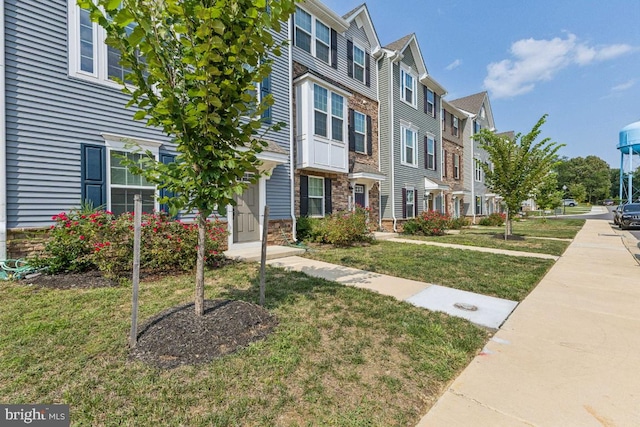 exterior space featuring a front lawn