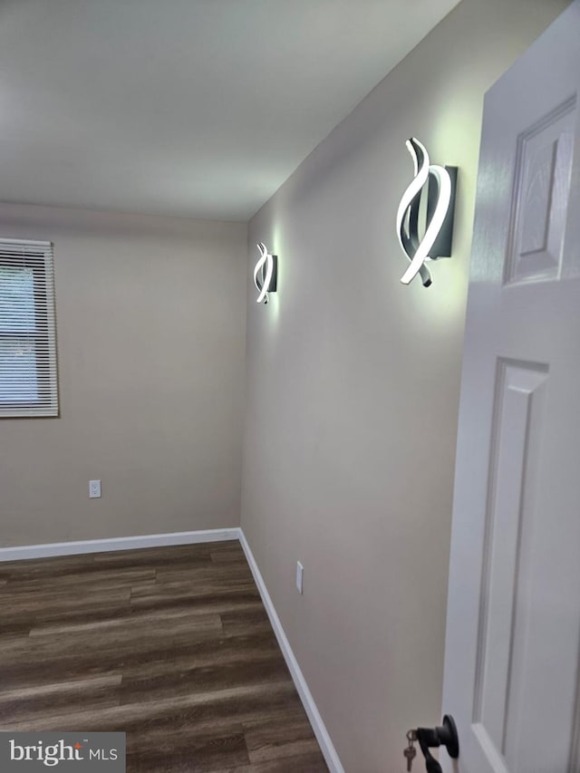 interior space with dark wood-type flooring