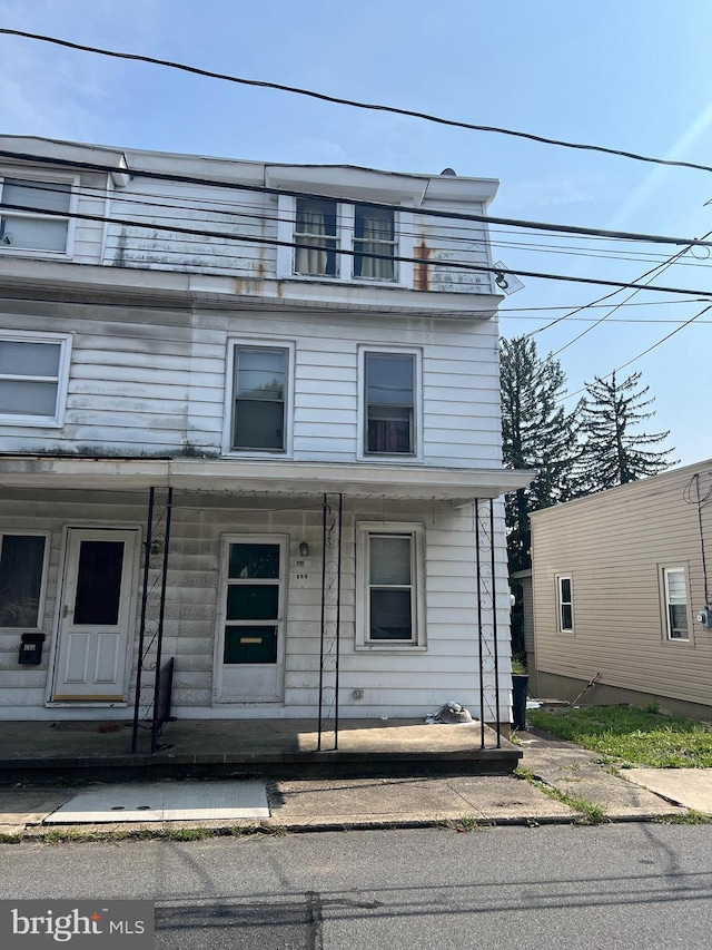 view of front of home featuring covered porch