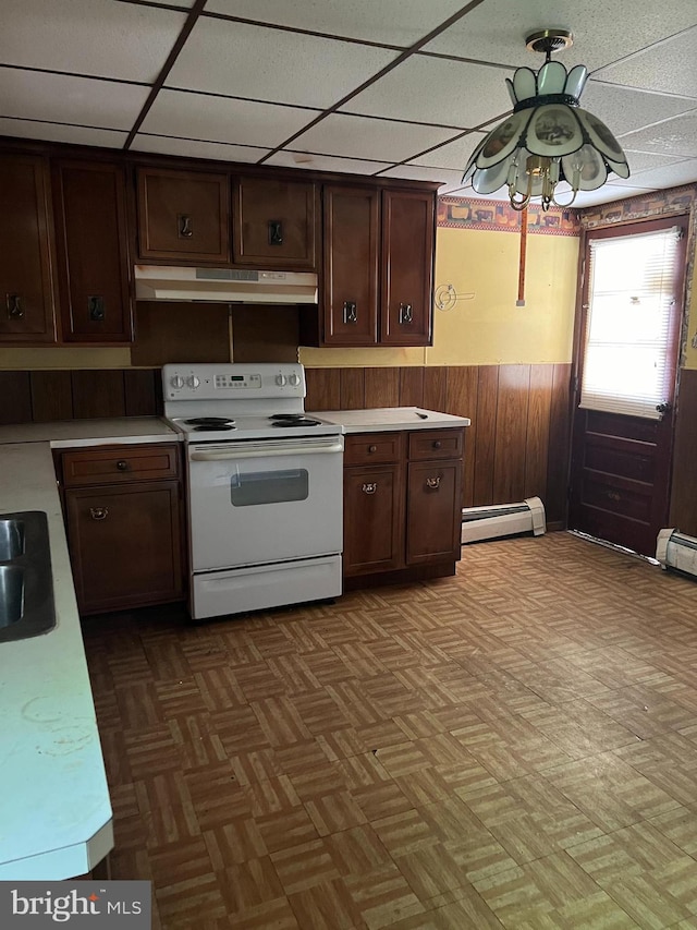 kitchen with a baseboard radiator, parquet flooring, ceiling fan, and white range with electric stovetop