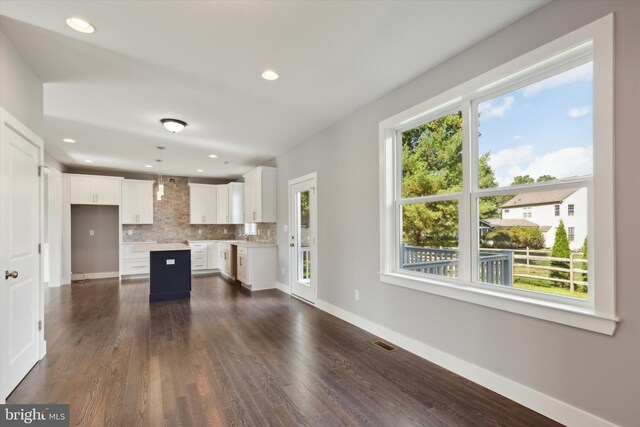 bathroom with hardwood / wood-style floors, vanity, and toilet