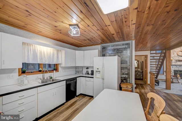 kitchen featuring white fridge with ice dispenser, light wood-type flooring, dishwasher, white cabinetry, and wood ceiling