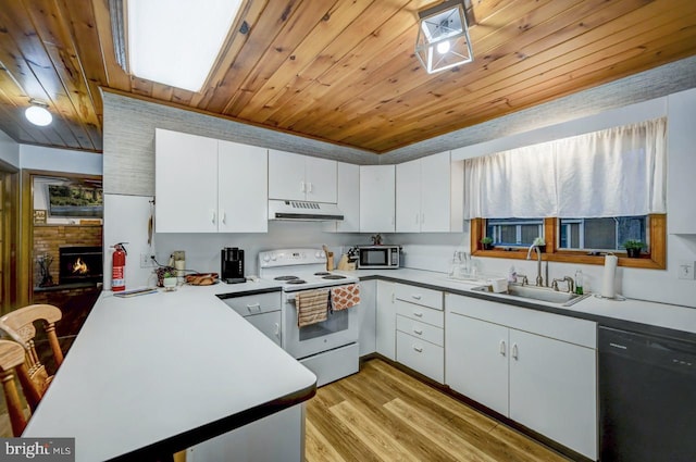 kitchen featuring light wood-type flooring, white electric range oven, white cabinets, dishwasher, and sink