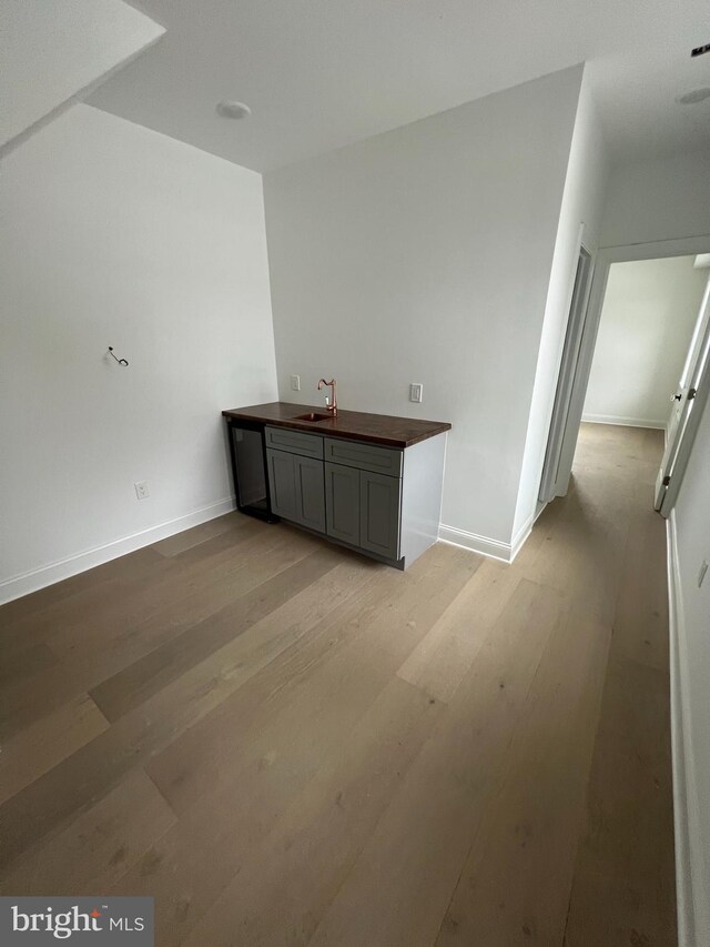 unfurnished living room with light hardwood / wood-style flooring