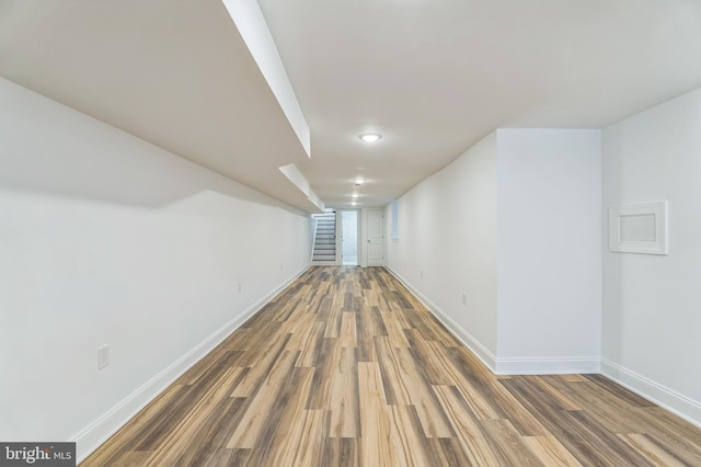 basement with wood-type flooring