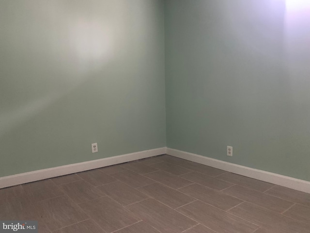 corridor featuring hardwood / wood-style flooring