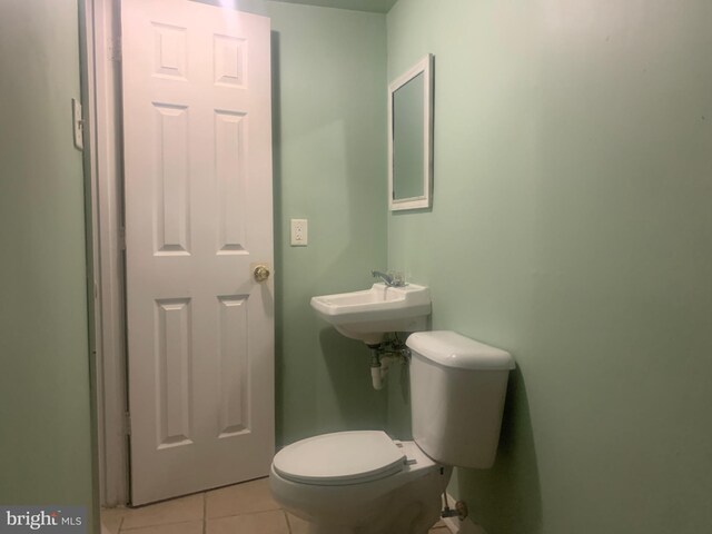 full bathroom featuring vanity, shower / tub combination, lofted ceiling, toilet, and hardwood / wood-style flooring