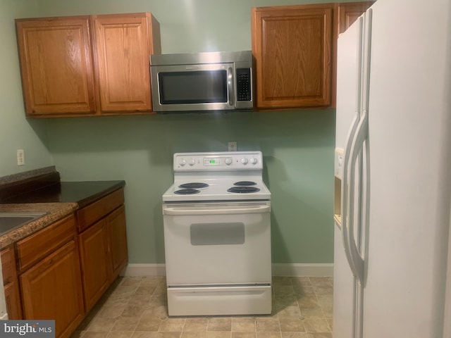 kitchen featuring white appliances