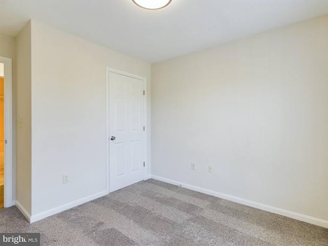 unfurnished bedroom with light carpet