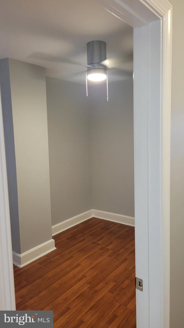 unfurnished room with hardwood / wood-style flooring