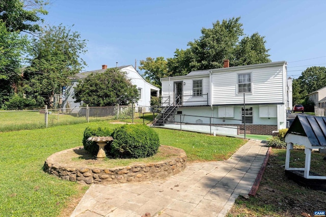 exterior space featuring a front lawn