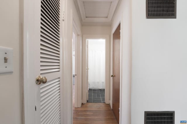 corridor with wood-type flooring