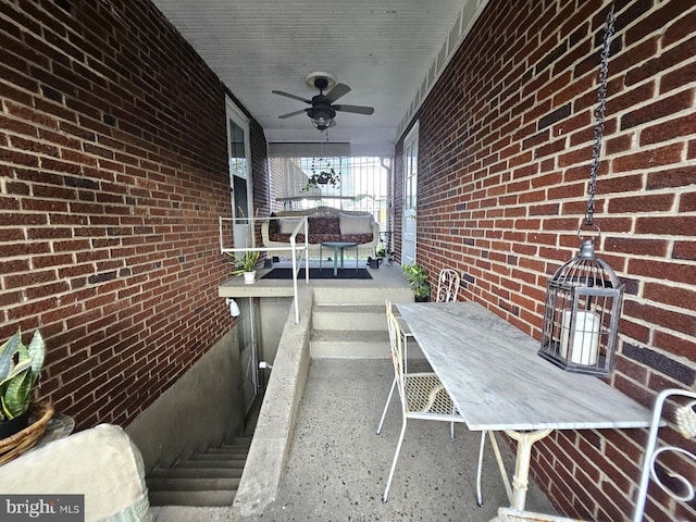 exterior space with ceiling fan