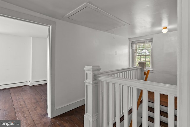 corridor featuring dark wood-type flooring