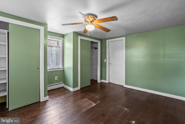 unfurnished bedroom with ceiling fan, hardwood / wood-style floors, and a baseboard heating unit