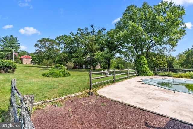 view of community featuring a lawn