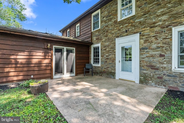 rear view of property with a patio area