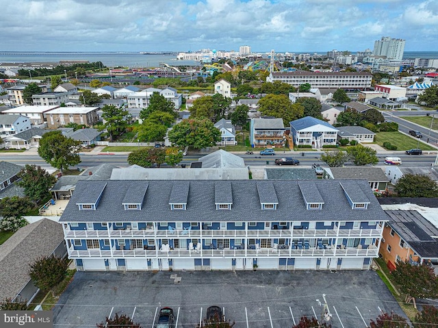 drone / aerial view with a water view