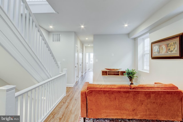 living room featuring light wood-type flooring