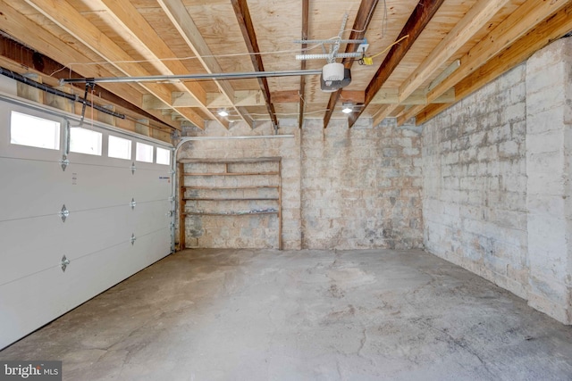 garage featuring a garage door opener