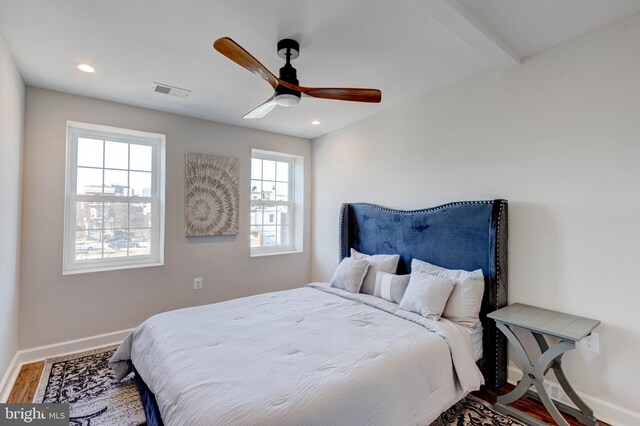 bedroom featuring ceiling fan and wood-type flooring