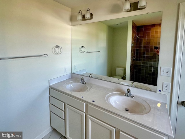 13810 Pulaski Dr Unit 72, Hagerstown, MD 21742 - full bathroom with toilet, double vanity, baseboards, and a tile shower