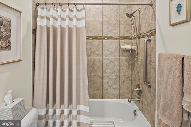 bathroom featuring shower / bath combination with curtain