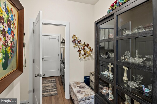 corridor featuring hardwood / wood-style floors