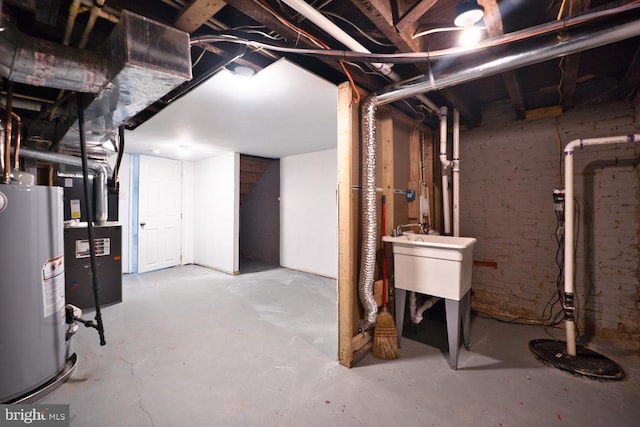 basement with gas water heater and heating unit