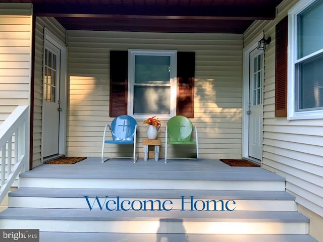 entrance to property with a porch