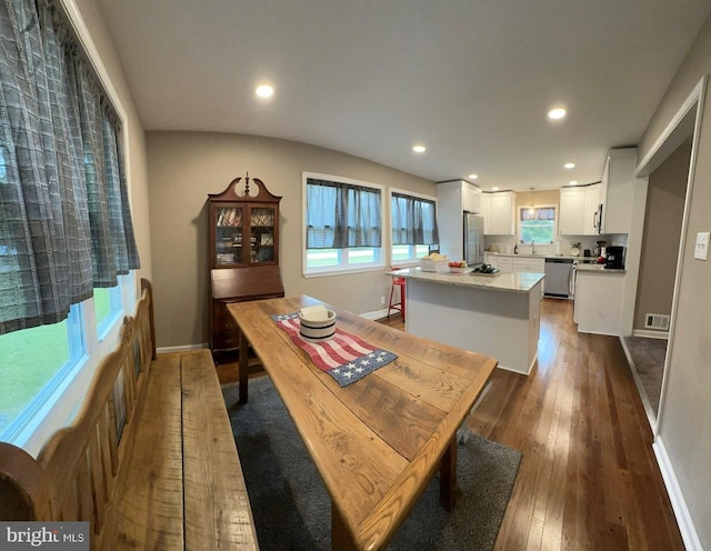 dining room featuring recessed lighting, visible vents, baseboards, and dark wood-style floors